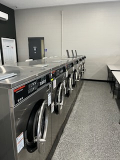 laundry machines at spin and spray laundromat
