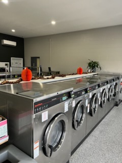 laundry machines at spin and spray