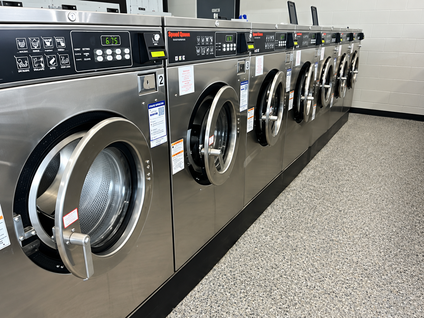 Laundry machines in a row